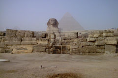 Sphinx with pyramid in the background in Gizah, Cairo Egypt