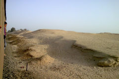 Desert at the edge of the railway line between Al Faiyum and Al Wasta in Egypt.