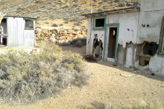 Old abandoned buildings at the Aguereberry Camp near Death Valley National Park, California, USA