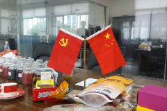Chinese flag and communist party flag on a meeting table in Suzhou, China