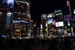 Shibuya crossing at night in Tokyo, Japan