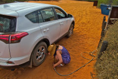 Inreasing air pressure for returning to the road at Shark Bay, Western Australia