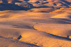 Desert landscape during sunset  at Valley of a Thousand Hills Campsite in Namibia