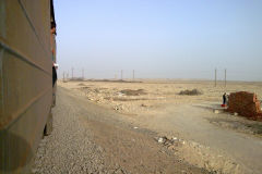 Desert landscape at the edge of the railway line between Al Faiyum and Al Wasta in Egypt.