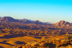 Desert landscape at sunset  at Valley of a Thousand Hills Campsite in Namibia