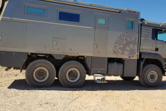 Rich luxury travelers in their mobile home at the Fish River Canyon in Namibia